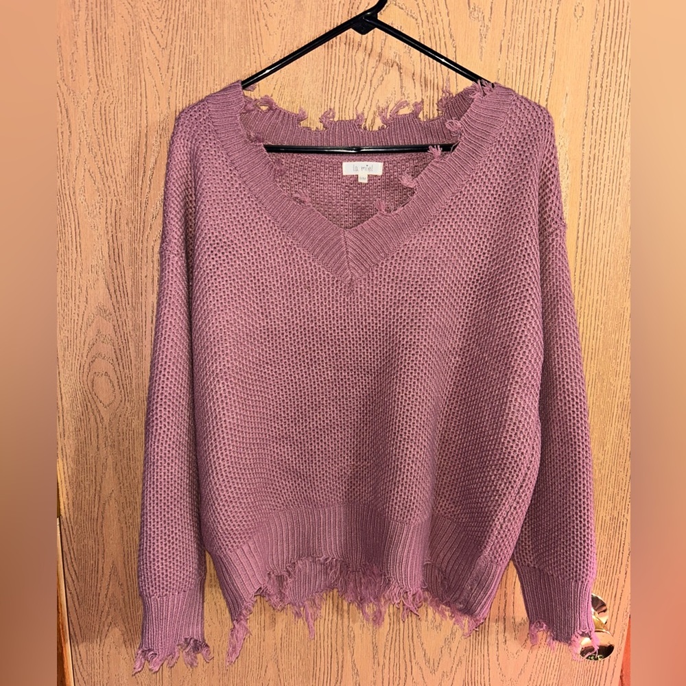 Cropped distressed v-neck sweater